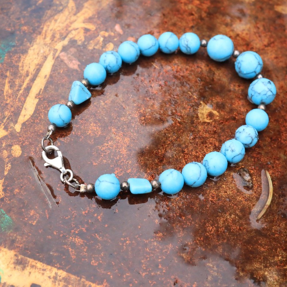 Blue howlite beaded bracelet with sterling silver clasp.  turquoise stone  look